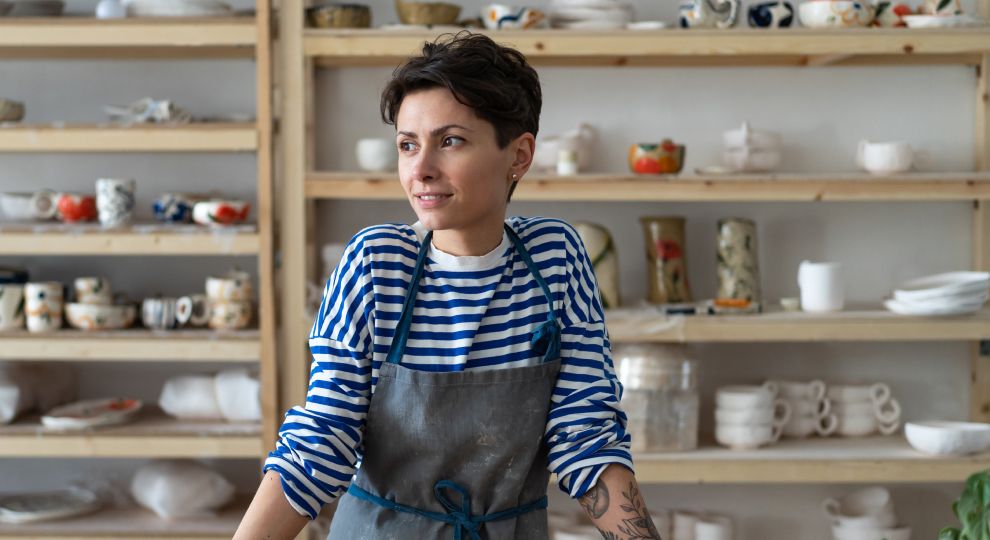 Woman behind her store counter