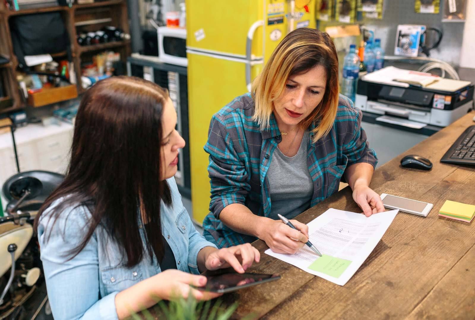 Two people going over financials