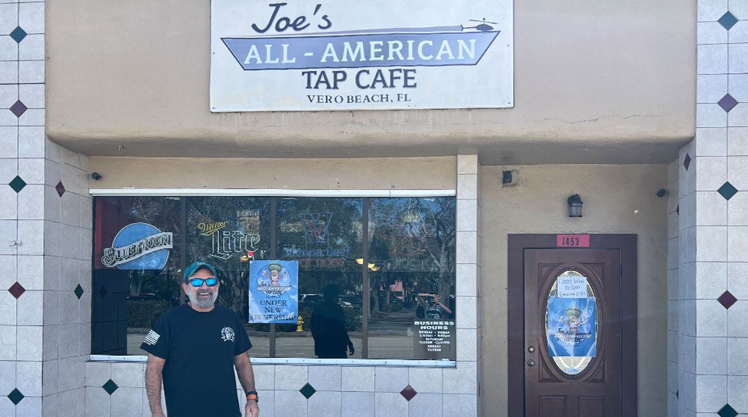 Joe St. John standing outside Joe's All American Tap Cafe