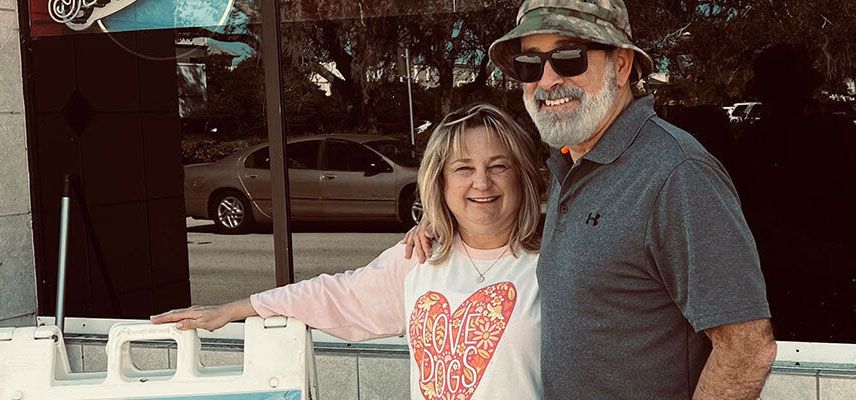 Joe St. John and his wife, Jonna, standing in front of the restaurant that they purchased in late 2023.