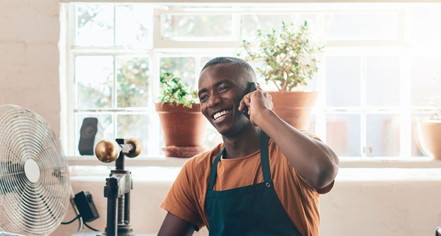 Man discussing his business plan on a phone