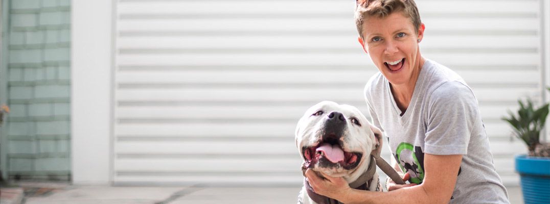 An image of Trots Dogs founder Joanna Stanford with a dog