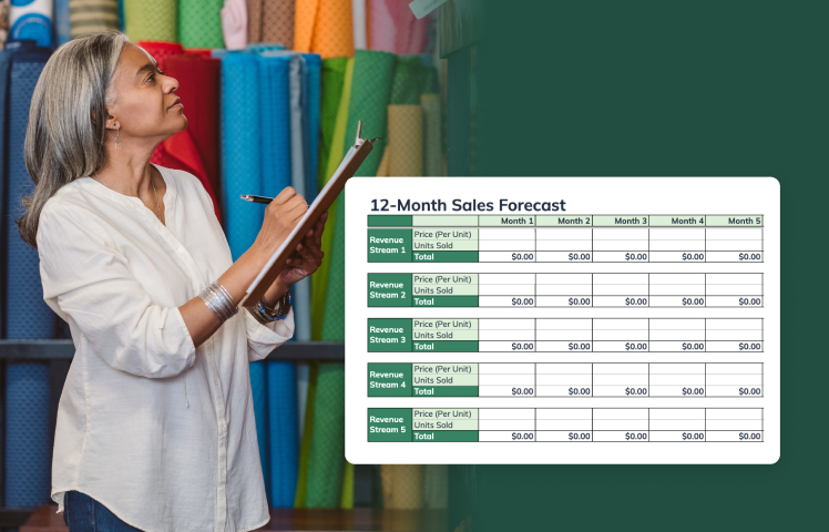 Woman working in fabric store with example sales forecast document